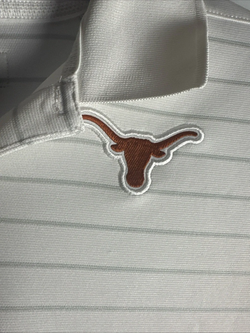 Nike White Polo with Orange Swoosh and Longhorn Patch